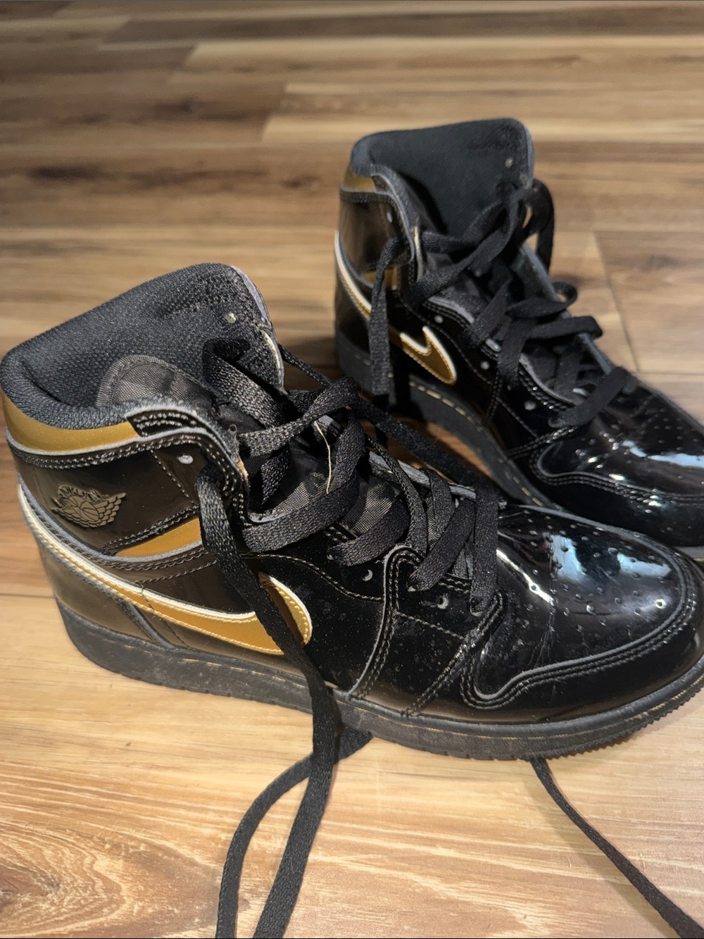 Nike Black and Gold High-Top Kids Sneakers